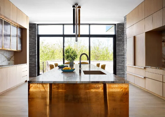 An open kitchen with a large island